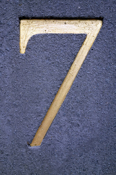 A Written Wording in Distressed State Typography Found Number 7