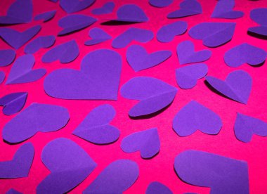 A Pink and Purple Paper Love Hearts Cut Out for Background for Valentines Day or Weddings