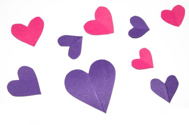 A Pink and Purple Paper Love Hearts Cut Out on White Background for Valentines Day or Weddings