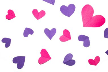 A Pink and Purple Paper Love Hearts Cut Out on White Background for Valentines Day or Weddings