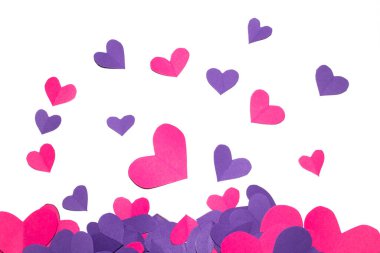 A Pink and Purple Paper Love Hearts Cut Out on White Background for Valentines Day or Weddings