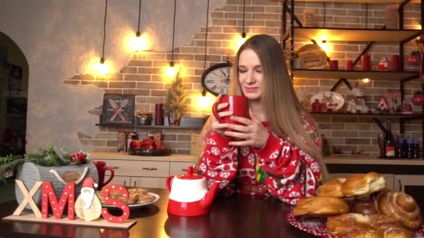 Attractive Woman Red Dress Drinks Cup Kitchen — Stockvideo