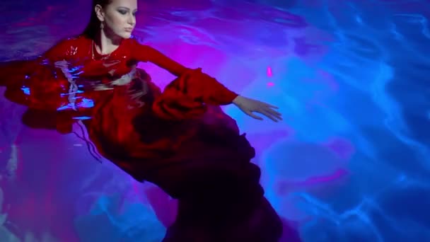 Slow Motion Woman Wearing Red Dress Floating Underwater — 비디오