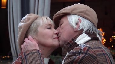Slow Motion A senior couple is kissing and cuddling.