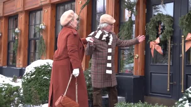 Slow Motion Senior Couple Walking City Street Winter Day — Stock Video