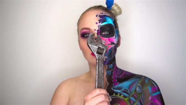 Slow Motion Young Woman Scared Halloween Makeup Holding Spanner — 图库视频影像