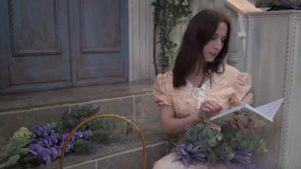 Woman Dress Sits Reading Book Duckling Basket — Video