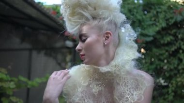 4K Tender fashion portrait of beautiful gentle young blond woman 