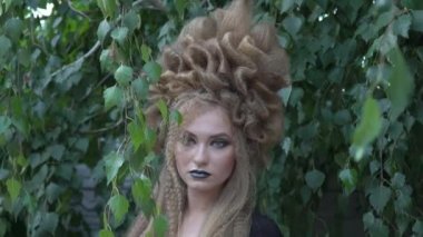 Slow Motion beautiful woman in the garden
