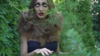 Girl with bright makeup and creative hairstyle