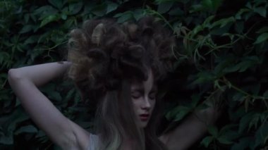 Slow Motion mythical creature in a green forest 