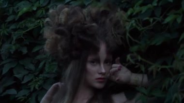 Slow Motion beautiful fairy girl elf in the forest