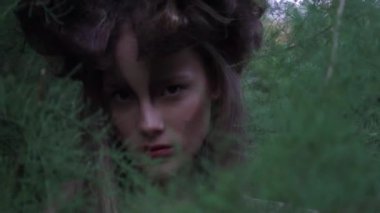 Slow Motion beautiful shamanic woman in the nature