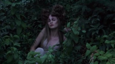 Elf. Beautiful girl. Fantasy young woman in woods