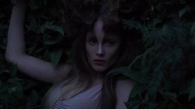 Slow Motion shooting cosplay girl elf in the forest