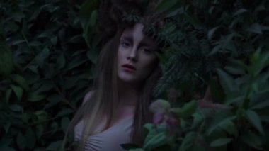 Slow Motion woman creature in a magical forest