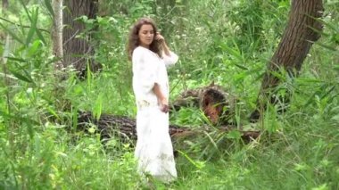 Tender happy woman in wild field enjoying nature. 