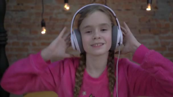 Cute Little Girl Headphones Teddy Bear Her Bedroom — Stockvideo