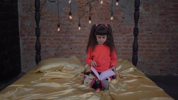 Cute Little Child Girl Reading Book Bedroom — Video