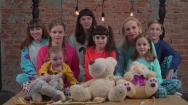 Slow Motion Group of happy kids in bedroom.