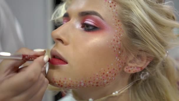 Makeup Artist Applies Lip Gloss Brush Lips Girl Bride — Video Stock