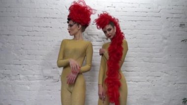 Slow Motion Creative unusual mohawk hairstyle. Sexy model girl with long hair