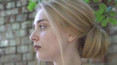 Slow Motion Beauty portrait of a beautiful blonde