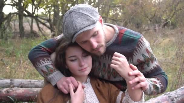 Pretty Couple Embracing Forest Background Firewood Logs — Video Stock