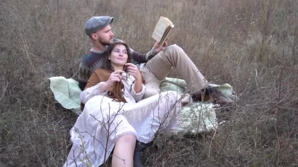 Slow Motion Happy Couple Reading Book Park Spring Day — Video Stock