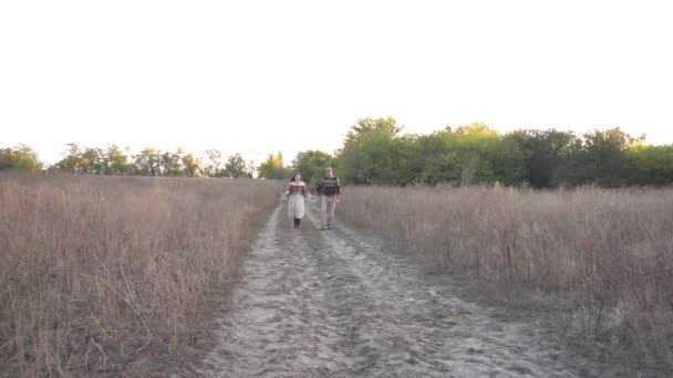 Slow Motion Couple Young Men Women Running Merrily Field — Stockvideo