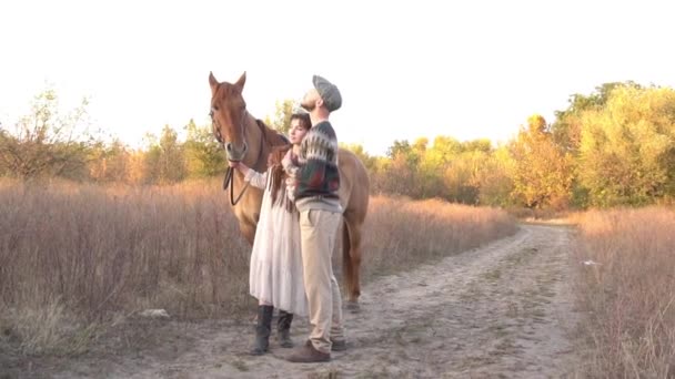 Charming Young Couple Stands Brown Horse Rays Evening Sun — Wideo stockowe