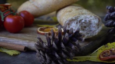 Slow Motion Tasty snacks with hot drink on table in autumn forest