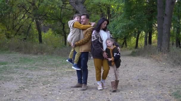 Lovely Family Autumn Park Young Parents Nice Adorable Kids — Video