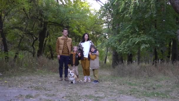 Young Family Children Dog Autumn Park — Vídeo de stock