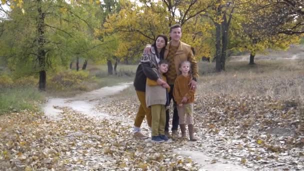 Family Enjoying Autumn Woodland Together — 图库视频影像