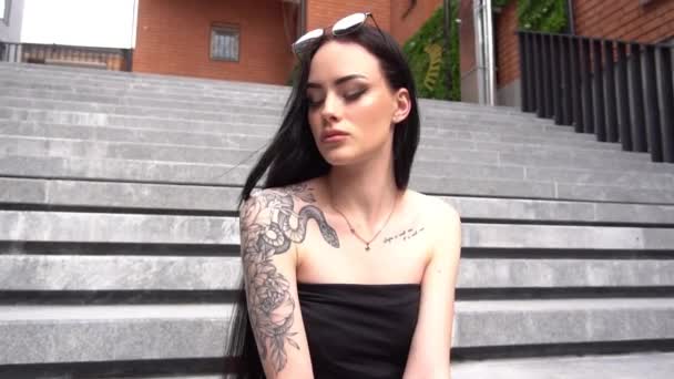 Fashionable Girl Sitting Stairs Town Square — Stockvideo