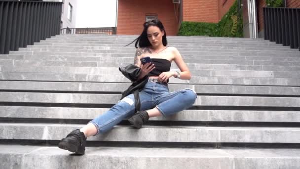 Slow Motion Beautiful Young Brunette Girl Sitting Stairs — ストック動画