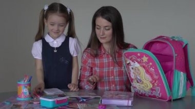 Slow Motion Mom helping her daughter do her homework