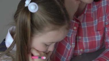 Slow Motion Happy family preparing for school. Little girl with mother.