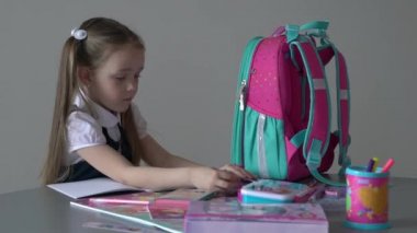 Slow Motion  little girl is happy to get knowledge and do her homework