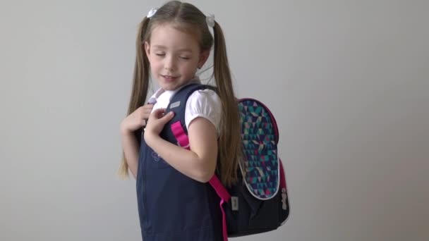 Slow Motion Portrait Schoolgirl Keeping Backpack Isolated White Background — Vídeo de Stock