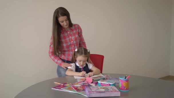 Mother Helps Daughter Her Homework — Αρχείο Βίντεο