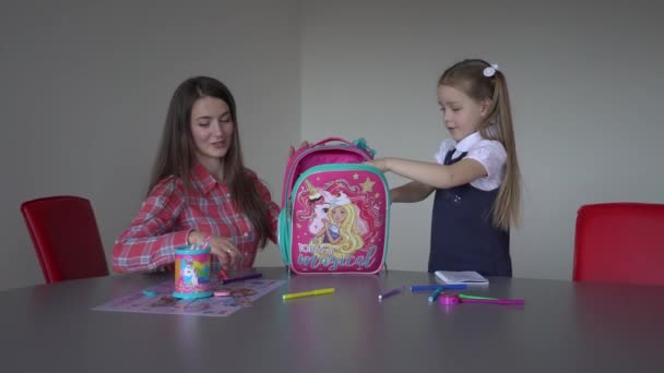 Mother Daughter Packing Backpack School Together Home — Video Stock