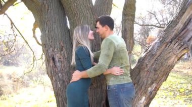 Slow Motion Nice Man Hugs His Beloved Woman in Autumn