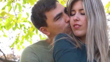 Slow Motion Woman with her husband outdoors in autumn sunny day