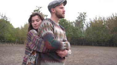 Slow Motion loving couple on ranch