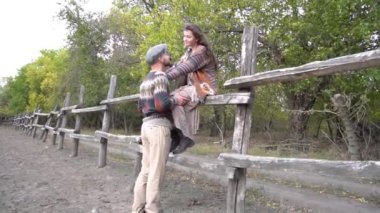 Slow Motion Couple on ranch.in an autumn