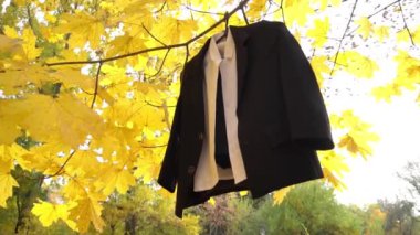 Slow Motion black suit on autumn brunch 