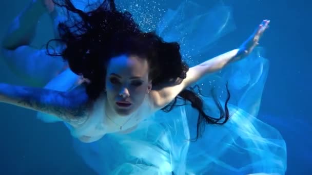 Slow Motion Girl Wearing Fashion White Dress Underwater Blue Deep — Vídeos de Stock