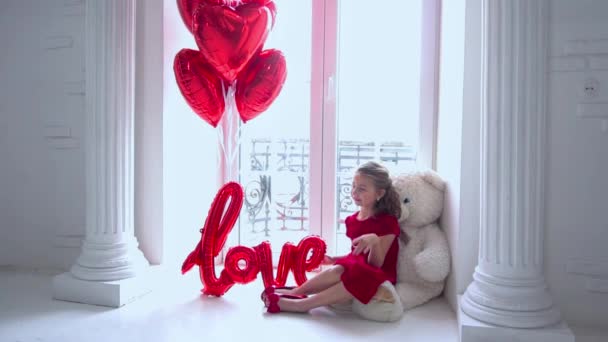 Slow Motion Beautiful Little Girl Red Dress Large Arched Window — Vídeo de stock